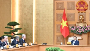 范明正总理会见美国—东盟商务理事会企业代表团。（陈海 摄）