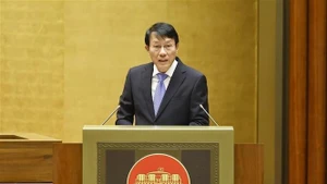 公安部部长梁三光作了报告。