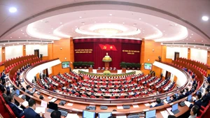 越南共产党第十三届中央委员会第十四次全体会议在首都河内开幕。（登科 摄）