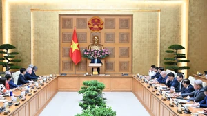 范明正总理会见美国—东盟商务理事会企业代表团。（陈海 摄）