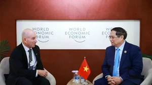 范明正总理会见美国Cisco集团亚太区总裁吴大维。（图片来源：越通社）