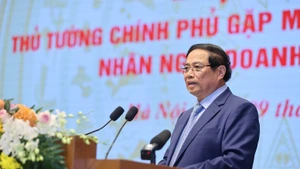 政府总理范明正发言。（图片来源：越通社）