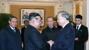 越共中央总书记苏林与朝鲜劳动党总书记、国务委员长金正恩。（图片来源：越通社）