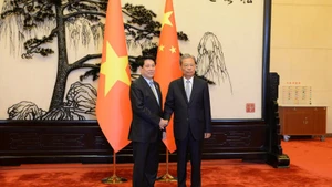 越南国家主席梁强会见中国全国人大常委会委员长赵乐际。