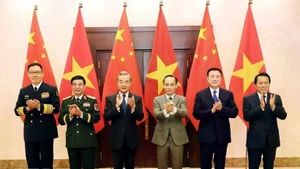 越中外交、国防、公安“3+3”战略对话机制首次部长级会议上的两国外交部长、国防部长和公安部长。