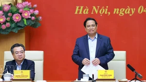 政府总理、政府党委书记范明正出席会议。