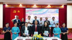 签约仪式现场。（图片来源：越通社）