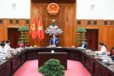 范明正总理主持会议。