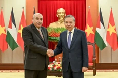 越共中央总书记苏林和约旦众议长马赞·卡迪。