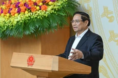 范明正总理在会上致辞。（陈海 摄）