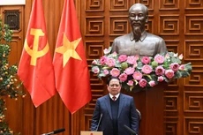 越南政府总理、国家核电站建设指导委员会主任范明正在会上致辞。（陈海 摄）