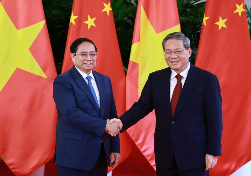 越南政府总理范明正与中国国务院总理李强。