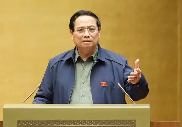 范明正总理在会上发表讲话。
