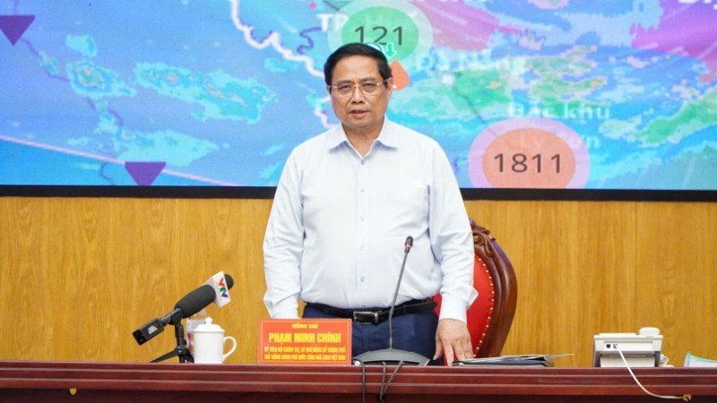 范明正总理在会上发表讲话。