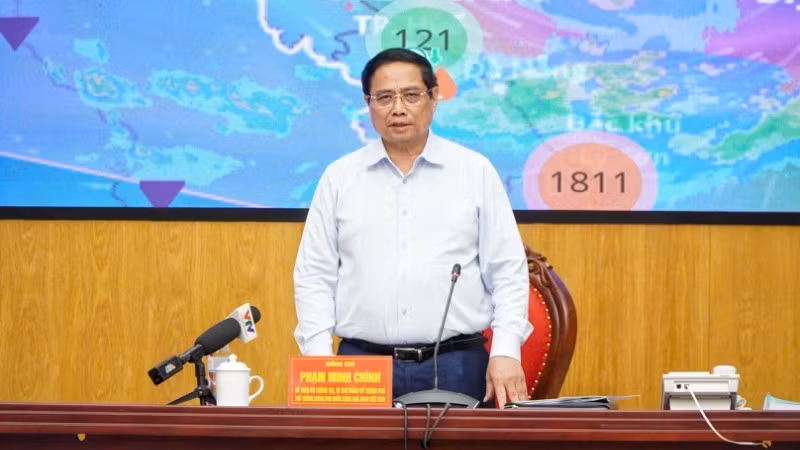 范明正总理在会上发表讲话。