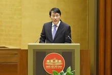 公安部部长梁三光作了报告。