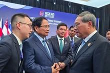 越南政府总理范明正会见中国国务院总理李强。