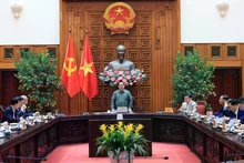 越南政府总理范明正主持召开政府常务会议。（图片来源：政府门户网）