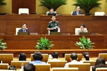 越南国防部长潘文江大将在会议上发言。（图片来源：越通社）