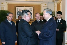 越共中央总书记苏林与朝鲜劳动党总书记、国务委员长金正恩。（图片来源：越通社）