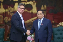 越南政府总理范明正会见美国惠普集团（HP）负责数字化转型与供应链事务全球高级副总裁安托万·科林。（图片来源：越通社）