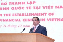 越南政府总理范明正在越南国际金融中心成立发布会上发表讲话。（陈海 摄）