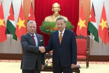 苏林总书记与约旦国王阿卜杜拉二世·伊本·侯赛因。