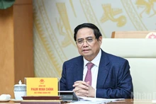 范明正总理在会上发言。（本报记者 陈海摄）