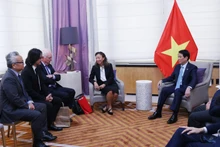 越南国家主席梁强会见了哥伦比亚大学韦瑟黑德东亚研究所和越南学项目的领导。（图片来源：越通社）