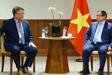 越南政府总理范明正会见Granja Fujikura集团领导人。（图片来源：越通社）