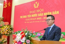 越共中央委员、《人民报》社总编辑、中央宣教与民运部副部长、越南新闻工作者协会主席黎国明在大会上发表讲话。