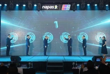 越南与中国宣布建立基于二维码的双边零售支付连接的仪式。