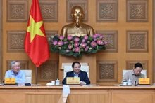 范明正总理主持召开两级地方政府模式实施一个月的初步总结会议。