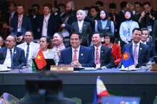 越南政府总理范明正出席东盟-新西兰领导人会议。(图片来源:越通社)