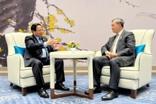 范明正总理会见柬埔寨首相洪玛奈。(图片来源:越通社)