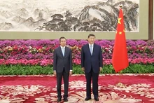 中国国家主席习近平与越南驻华大使范清平合影。（图为中国央视视频截图）