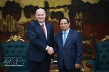 越南政府总理范明正会见俄罗斯联邦应急部部长亚历山大·库伦科夫。