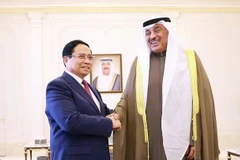 越南政府总理范明正会见科威特王储谢赫萨巴赫·哈立德·萨巴赫。（图片来源：VGP）