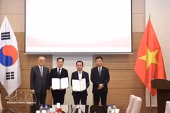 签约仪式现场。（图片来源：越通社）