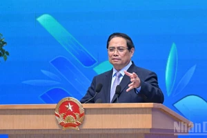 越南政府总理范明正在会上致辞。（图片来源：越通社）