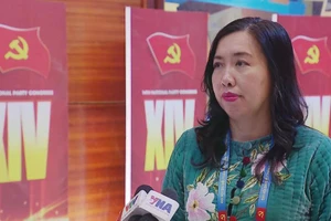 越南外交部副部长黎氏秋姮接受媒体记者采访。（图片来源：越通社）