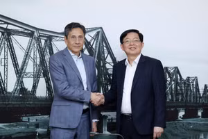 越南政府副总理胡国勇会见瑞士FS Finance Suisse AG公司董事长罗兰·施陶布。（图片来源：政府报）