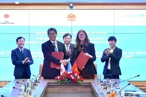 签字仪式现场。（图片来源：越通社）