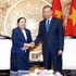 越共中央总书记、国家主席苏林会见老挝人民革命党中央组织部部长西赛。（登科 摄）