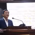 越南驻老挝大使阮明心发表讲话。图自越通社