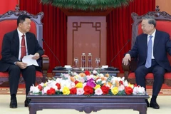 苏林总书记会见老挝公安部部长万通·贡马尼上将。