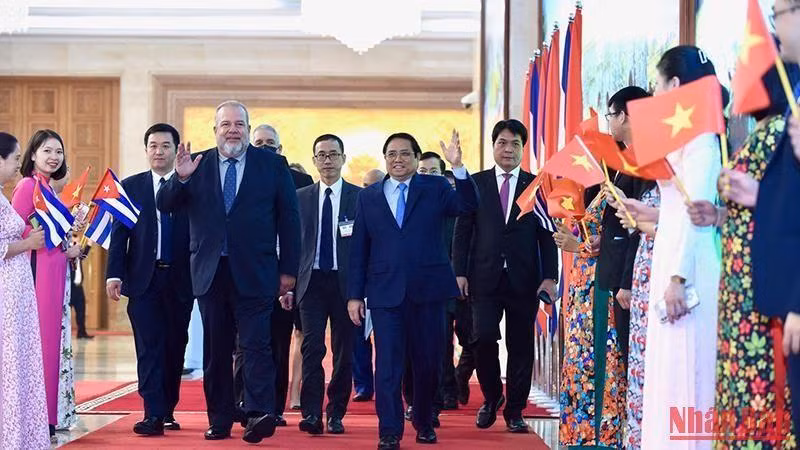 越南政府总理范明正与古巴总理曼努埃尔·马雷罗。（陈海 摄）