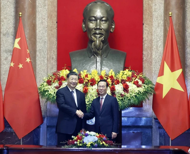 越南国家主席武文赏与中共中央总书记、中国国家主席习近平.。