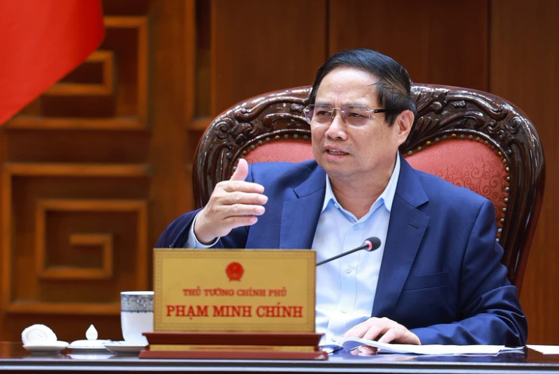 范明正总理在会上发表讲话。（图片来源：越通社）