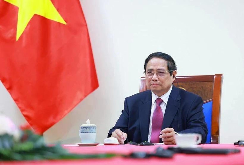 越南政府总理范明正与新西兰总理克里斯托弗·拉克森通电话（图片来源：越通社）